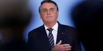 Brazil's President Jair Bolsonaro attends the ceremony of National Volunteer Day at the Planalto Palace in Brasilia, Brazil August 26, 2021. REUTERS/Adriano Machado  Foto: Reuters