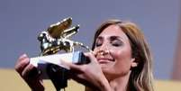 Audrey Diwan recebe o Leão de Ouro de melhor filme po "L'événement" no Festival de Veneza, Veneza, Itália, 11/09/2021 REUTERS/Yara Nardi  Foto: Reuters