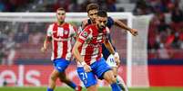 Atlético de Madrid e Porto ficaram no empate na estreia da Champions League (Foto: GABRIEL BOUYS / AFP)  Foto: Lance!