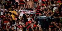 Muitos torcedores do Flamengo não utilizaram máscara no duelo contra o Grêmio  Foto: Nayra Halm/Agência O Dia / Estadão Conteúdo