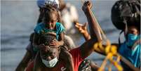 Haitianos dizem não querer voltar a seu país  Foto: Getty Images / BBC News Brasil