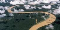 O rio Japurá, na fronteira entre o Brasil e a Colômbia, é afluente do rio Solimões  Foto: Getty Images / BBC News Brasil