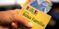 Mudança pesa para 37% dos 14,7 milhões de beneficiários do Bolsa Família.  Foto: Agência Brasil / Estadão