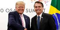 Trump e Bolsonaro, durante a cúpula do G20 no Japão em 2019  Foto: DW / Deutsche Welle