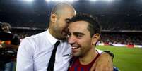 Xavi e Guardiola protagonizaram grandes momentos no Barcelona (Foto: Divulgação / Site oficial do Barcelona)  Foto: Lance!