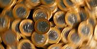 Moedas de reais
15/10/2015
REUTERS/Bruno Domingos  Foto: Reuters