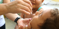 Em 2020, cerca de 1 milhão de crianças brasileiras não receberam as doses de vacina contra a poliomielite  Foto: Erasmo Salomão/Ministério da Saúde / BBC News Brasil