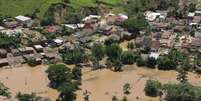 Imagem mostra cidade alagada na Bahia.  Foto: Imagem: Is&aacute;c N&oacute;brega/Ag&ecirc;ncia Brasi / Alma Preta