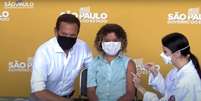Caetano de Jesus Moreira foi primeira criança vacinada com CoronaVac no Brasil  Foto: Governo de SP/Youtube/Reprodução - 20/01/2022 / Estadão