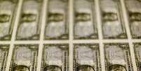 Cédulas de dólar em centro de impressão em Washington. 14/11/2014 REUTERS/Gary Cameron  Foto: Reuters