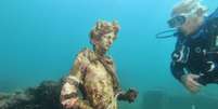Estátua no parque arqueológico submarino de Baia, na Itália  Foto: ANDREAS SOLARO/AFP via Getty Images / BBC News Brasil