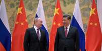 Putin e Xi Jinping durante encontro em Pequim  Foto: Reuters