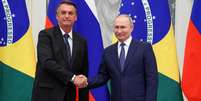Bolsonaro e Putin durante encontro em Moscou   Foto: Sputnik/Vyacheslav Prokofyev