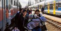 Os refugiados ucranianos têm fugido para países vizinhos, como a Romênia  Foto: Getty Images / BBC News Brasil
