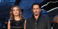 Em 2016, a modelo e atriz norte-americana Amber Heard abriu processo contra  o ator e diretor Johnny Depp, acusando-o de violência doméstica. A modelo pediu divórcio  Foto: Reuters
