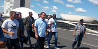 Bolsonaro chegou por volta das 11h30 ao ato organizado por seus apoiadores contra o STF em Brasília  Foto: Rodrigo Silviano/Estadão