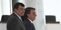 Paulo Sergio Nogueira, ministro da Defesa, com o presidente Jair Bolsonaro  Foto: Reuters