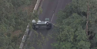 Motorista tenta desviar de corpo na Marginal Tietê, bate o carro e capota  Foto: Reprodução/TV Globo
