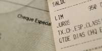 Imagem mostra extrato com cheque especial.   Foto: fdr