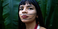 Txai Suruí foi uma das lideranças indígenas ameaçadas de morte em 2021, segundo relatório da CPT  Foto: BBC News Brasil