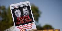 Imagem pede justiça para Bruno Pereira e Dom Phillips  Foto: Ueslei Marcelino / Reuters
