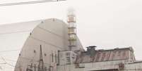 Reator de Chernobyl coberto por um "sarcófago" de concreto e ferro (Imagem: Reprodução/antonpetrus/envato)  Foto: Canaltech