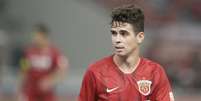 Oscar tem acordo com o Flamengo e aguarda liberação oficial do Shanghai Port FC (Foto: STR / AFP)  Foto: Lance!