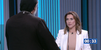 Os candidatos Padre Kelmon (PTB) e Soraya Thronicke (União Brasil) trocam acusações durante debate   Foto: TV Globo 