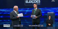 Lula e Bolsonaro durante o debate de Band, neste domingo  Foto: 
