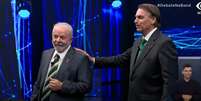 Jair Bolsonaro surpreendeu Lula com contato físico no debate  Foto: Reprodução/TV