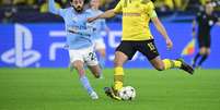 Manchester City e Borussia Dortmund fizeram jogo morno na Alemanha (Foto: SASCHA SCHUERMANN / AFP)  Foto: Lance!