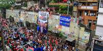 Visita de Lula ao Complexo do Alemão, no Rio, colocaram as favelas em destaque na corrida eleitoral do segundo turno  Foto: Estadão Conteúdo/Alexandre Silva