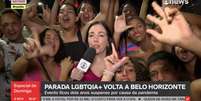 Repórter Patrícia Fiuza não conseguiu concluir o 'ao vivo' após ser cercada por LGBTs lulistas  Foto: Reprodução/TV