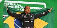 Lewis Hamilton conquistou uma vitória para a história em Interlagos   Foto: AFP / Grande Prêmio