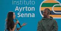 Piloto Lewis Hamilton em visita a uma escola pública da zona sul da capital paulista.  Foto: Felipe Rau/Estadão / Estadão