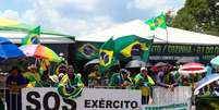 Manifestação de apoiadores de Bolsonaro acampados em frente ao QG do Exército em Brasília  Foto: Wilton Junior/Estadão / Estadão