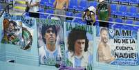 Torcida argentina leva faixas para estádio   Foto: Issei Kato / Reuters