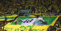 Torcida brasileira leva desejo de melhora de Rei Pelé ao Catar  Foto: REUTERS