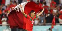 Jawad El Yamiq comemora uma das vitórias de Marrocos na Copa do Mundo  Foto: Reuters