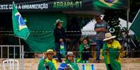 À espera de golpe contra Lula, acampamento bolsonarista em Brasília se mantém e incomoda transição  Foto: REUTERS