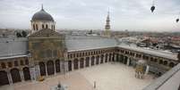A cidade velha de Damasco reúne símbolos da rica história da Síria, como a mesquita de Umayyad, do século 8  Foto: LOUAI BESHARA/Getty Images / BBC News Brasil