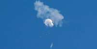 Balão no céu  Foto: Reuters / BBC News Brasil