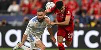 Liverpool e Real Madrid entram em campo pela Champions League, nesta terça-feira (Foto: Paul ELLIS / AFP)  Foto: Lance!