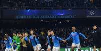 Jogadores do Napoli comemoram classificação histórica (Foto: TIZIANA FABI / AFP)  Foto: Lance!