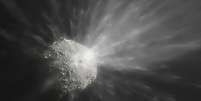  Ilustração mostra a ejeção de uma nuvem de detritos depois que a espaçonave DART colidiu com um asteroide   Foto: ESO/M. Kornmesser