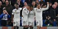 Em Londres, o Real confirmou a classificação diante do Chelsea com dois gols de Rodrygo (GLYN KIRK / AFP)  Foto: Lance!