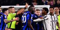 Lukaku e Cuadrado discutem após comemoração (Foto: Marco BERTORELLO / AFP)  Foto: Lance!