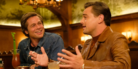 Brad Pitt e Leonardo DiCaprio em cena de Era uma Vez em... Hollywood.  Foto: Adoro Cinema