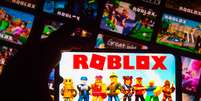 Roblox é um jogo infantil com itens pagos com dinheiro real  Foto: Getty Images