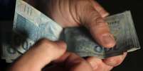 Dinheiro   Foto: Agência Brasil